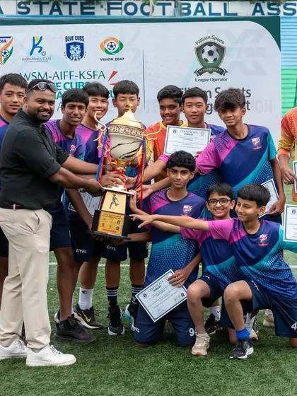 A closer look at our U15 champions and their coach celebrating their first tournament win of the season. This is just the beginning of their journey to success.