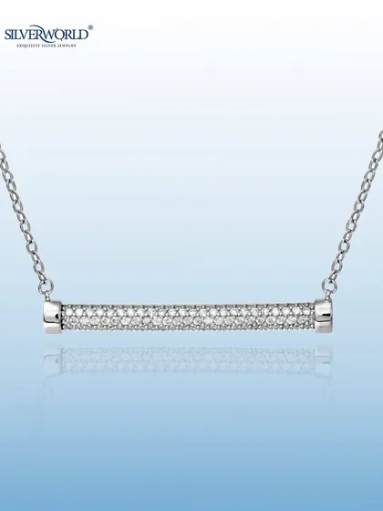 A modern and minimalist bar pendant, this piece is adorned with tiny marcasite stones for a subtle, vintage sparkle. It hangs on a delicate chain, making it perfect for office wear or layering.