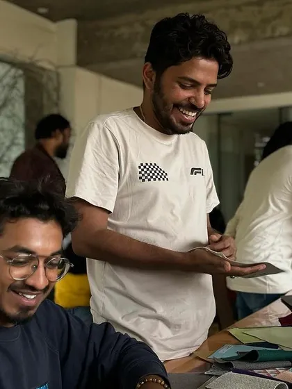 Team members smiling and engaging during the workshop.