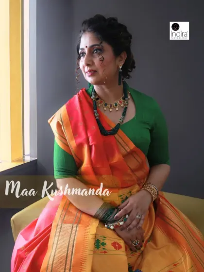 Representing Maa Kushmanda, this portrait uses natural window light to create a soft, ethereal glow. The vibrant orange and yellow saree, paired with a green blouse, brings warmth and energy to the image, reflecting the goddess's creative force.
