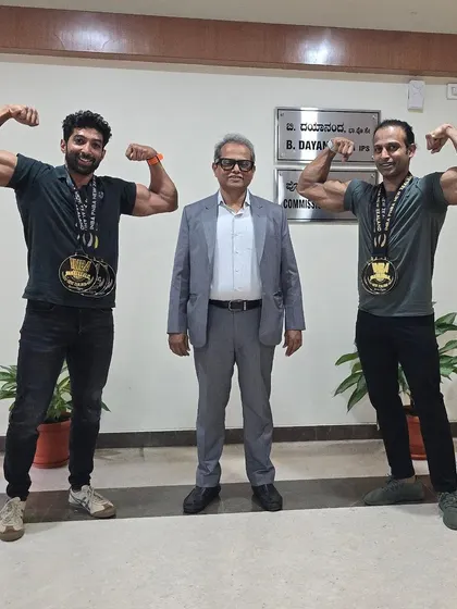 Flexing with my teammate Shodhan Rai and Bengaluru Police Commissioner B. Dayananda sir after our win. It's great to have the support of respected community leaders.