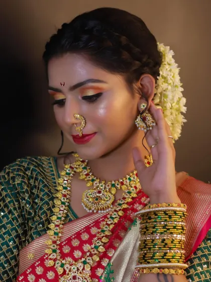 A demonstration look for our students, showcasing a classic Maharashtrian bride. The look features a traditional braid, fresh flowers, and flawless makeup.