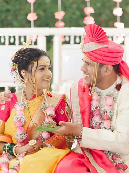 A sweet, interactive moment between the bride and groom during their ceremony.