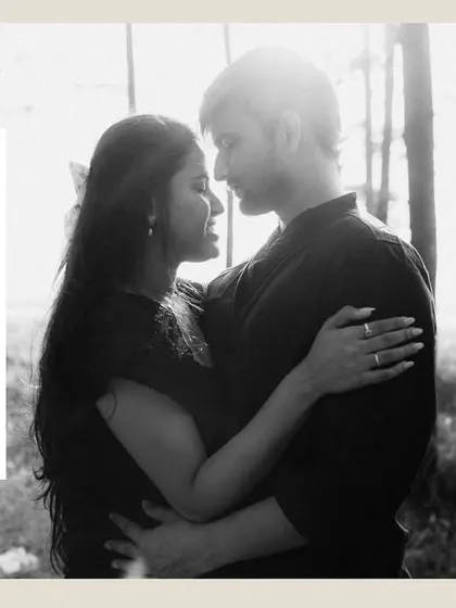 A black and white collage focusing on an intimate embrace and windswept hair. These artistic shots highlight the romantic and sensory details of a beach pre-wedding shoot.