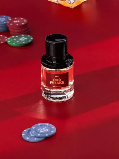 Capturing a luxurious Diwali party feel for Fraganote's "Oud Pataka". The dark, moody setup with poker chips and a glass of whiskey creates a narrative of celebration, risk, and sophistication.