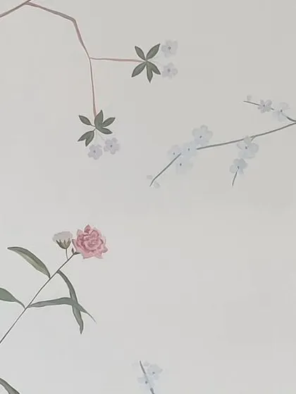 A duplicate image of the bird in a cage detail.