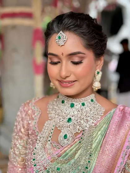Manasa's look is a beautiful fusion of tradition and modernity, perfect for the bride who wants a unique and personal touch.