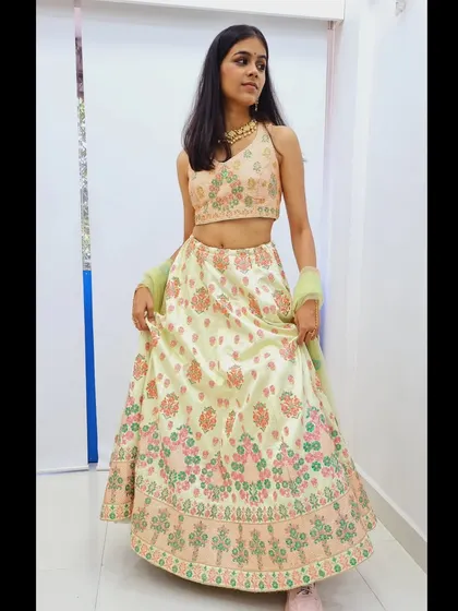 A duplicate of 227, another shot of the beautiful pastel green lehenga.
