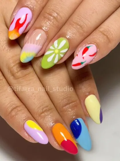 Express your creativity with mismatched, vibrant nail art. This set features flames, flowers, and chili peppers. Our courses encourage you to play with different icons and styles to create unique, personalized sets.