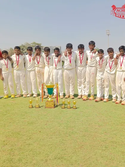 Our victorious U-12 team with their coaches. This win is a result of months of hard work and dedicated guidance.