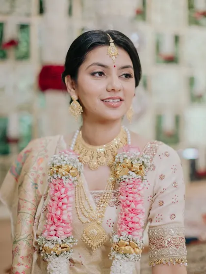 A perfect example of my signature 'Desi Clean Girl' look on a bride in an ivory saree. The makeup is minimal, the skin is luminous, and the overall feel is effortlessly elegant.