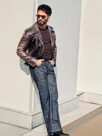 Shahid Kapoor being a whole mood. The lighting in this shot really brings out the rich texture of the brown leather jacket.