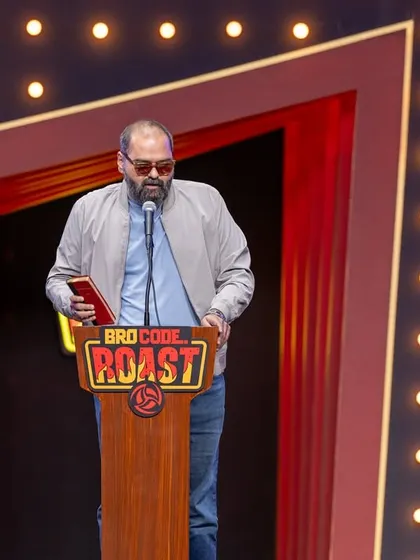 A solo shot of Kunal Kamra at the podium during the Bro Code Roast.