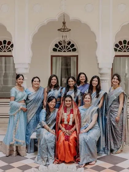 A formal group portrait of the bride and her entire bride squad, a beautiful memory of her support system.