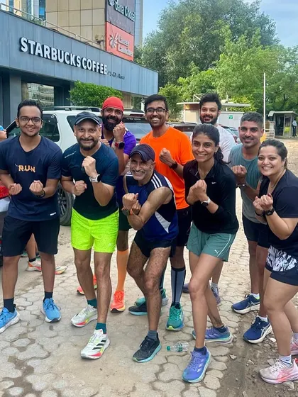 The post-run coffee is earned. A group of our runners outside Starbucks, celebrating another session of consistent effort.