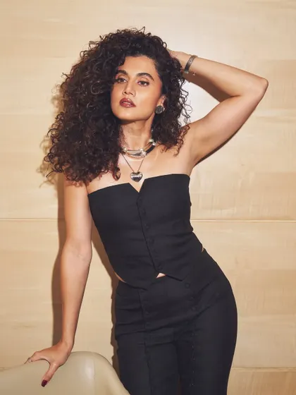 Power and poise. Taapsee's confident stance perfectly complements this sharp, minimalist all-black look.