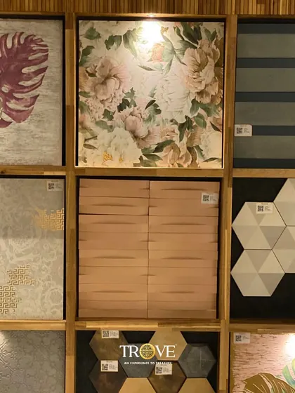 A selection of my patterned and textured tiles. You can see floral prints, geometric hexagons, wood-look textures, and leaf motifs, all designed to help you create a unique and elegant space.