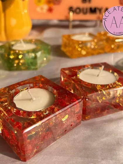 My ready-to-ship resin tea-light holders in festive red and gold, perfect for adding a warm glow to your Diwali decorations.