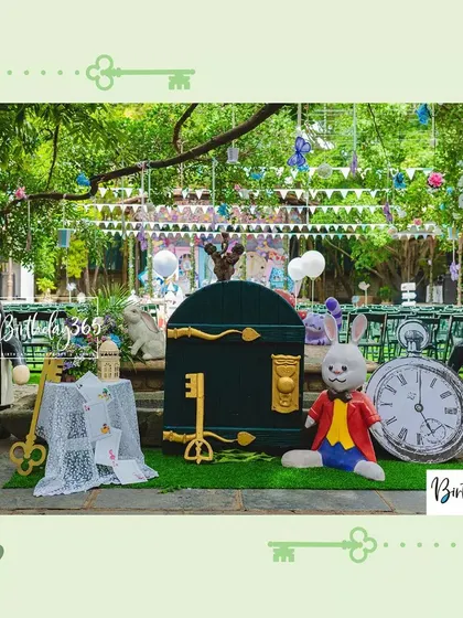 Whimsical props from our Alice in Wonderland theme, including the White Rabbit, a giant clock, and Card Soldiers.