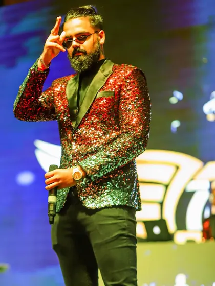 Another shot of our vocalist, exuding confidence and style. We bring a trendy, modern aesthetic to every corporate performance.
