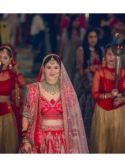 The moment the world stops. I live for capturing these grand bridal entries, where the heroine of our film makes her entrance. The lights, the colours, the emotions, it's pure magic.