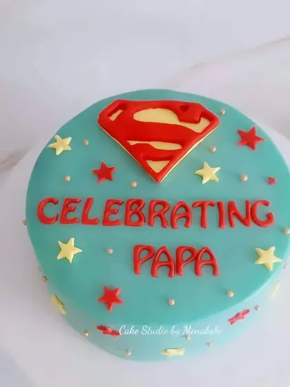 Celebrating a super-dad. This simple but powerful cake features the Superman logo, a perfect way to honor a family's hero.