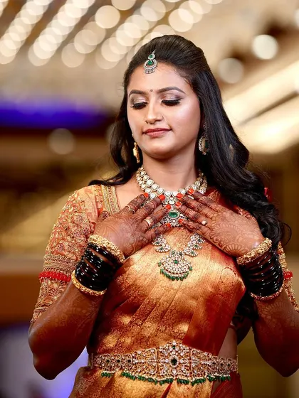 A closer look at Supriya's reception makeup. The soft, blended eyeshadow and radiant skin create a look that is both glamorous and timeless.