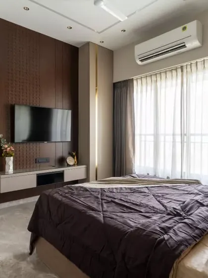 Step into luxury and serenity with this modern bedroom oasis. A perfect harmony of rich wooden accents, soft neutrals, and flowing natural light creates the perfect blend of warmth and sophistication.