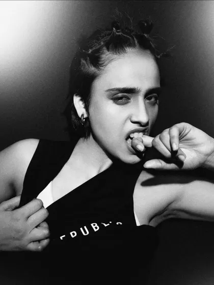 An intense and raw close-up. This black and white shot captures a moment of pure, unfiltered emotion.