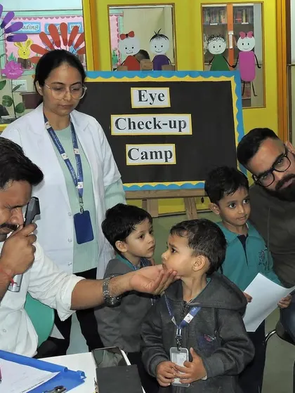 A team of healthcare professionals works together to conduct the eye check-ups, ensuring every child receives attentive and expert care.