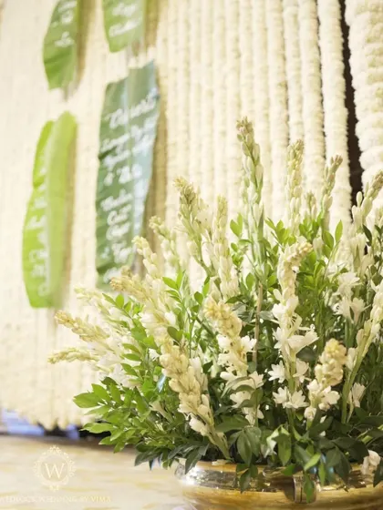 A creative and sustainable detail for a South Indian wedding. We used banana leaves with beautiful calligraphy as menu cards, adding an authentic and eco-friendly touch.