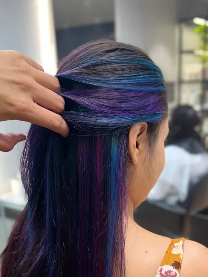 Peek-a-boo color is all about fun. Here we added pops of purple, pink, and blue for a playful and hidden rainbow effect.