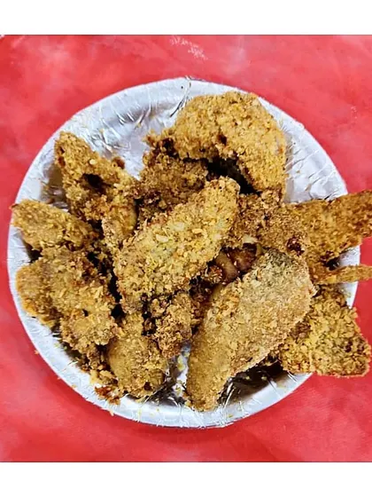 Our Indian-style fish crumbs are a hit. The fish is marinated in spices, coated in breadcrumbs, and fried until perfectly crisp on the outside and juicy on the inside.