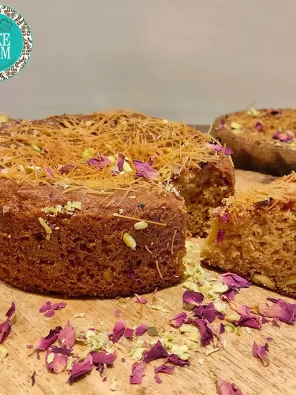 Our Rose Pistachio Kunafa tea time cake. This cake combines the delicate flavors of rose and pistachio with the unique texture of crispy kunafa pastry for a Middle Eastern-inspired treat.