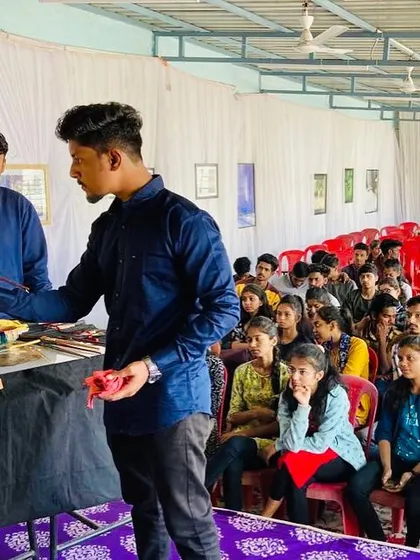 Engaging with students during a live oil painting demonstration at Nav Krishna Valley College of Fine Art in Sangli. I believe in an interactive approach, answering questions about technique and materials throughout the session.