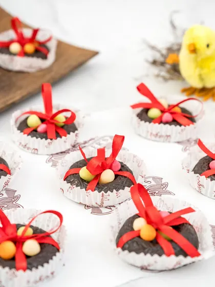 A collection of our chocolate Easter nests, each filled with colourful candy eggs. They are a fun and festive treat for the season.