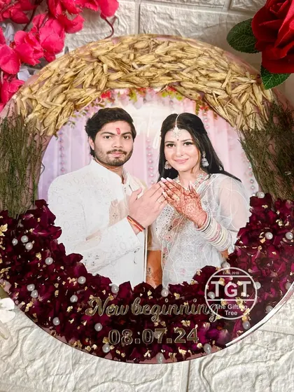 The phrase "New beginning" and the engagement date are captured in gold, marking the start of the couple's journey together.