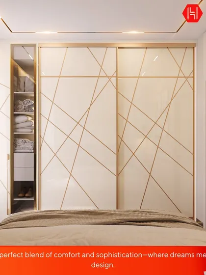 A perfect blend of comfort and sophistication. This bedroom showcases a sliding wardrobe with geometric gold inlay, providing ample storage while serving as a statement piece. The design is both practical and beautiful.