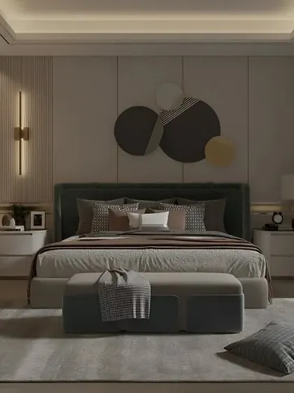 A contemporary bedroom featuring sleek, handleless wardrobes with smoked glass doors. The neutral color palette and clean lines contribute to a sophisticated and clutter-free look.