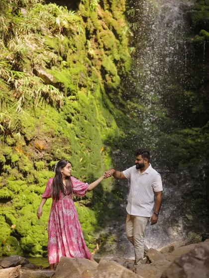 Another beautiful moment from the waterfall session in Rishikesh. The movement in her dress and the spray from the falls add a dynamic and romantic feel to this pre-wedding photograph.