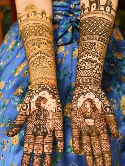 A complete bridal design featuring regal portraits of the couple on each palm. The arms are adorned with traditional motifs, including architectural elements, creating a truly grand statement.
