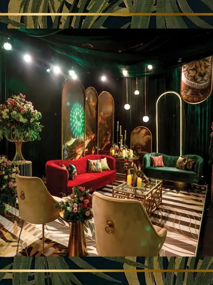 A closer look at one of the luxurious lounge areas, where rich textures and colours come together. The combination of velvet seating, custom art panels, and soft lighting provided a comfortable and stylish space for guests to relax and socialize.