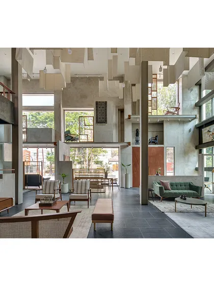 We designed the Magari furniture showroom in Hyderabad to be an experience in itself. The double-height space with its raw concrete and natural light creates the feeling of an open, expansive home, allowing each piece of furniture to be seen in a meaningful context.