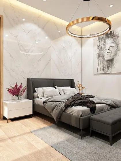 The younger daughter's bedroom in our 'Traditional Contemporary Glam' project. The room features a stunning marble accent wall, a modern circular chandelier, and a sophisticated grey and white color scheme.