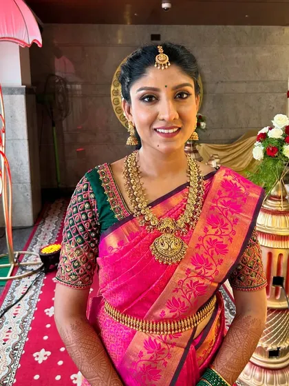 Another full-view shot that captures the complete elegance of the bride's attire and makeup. My goal is always to create a cohesive look from head to toe.