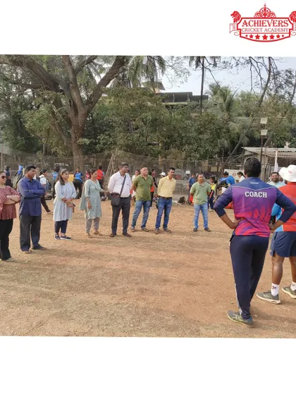 Parents and guardians observing the selection trials, showing the strong community support behind our girls' program.