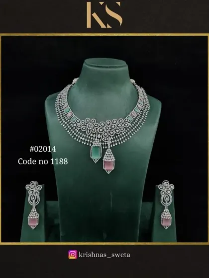 A unique version of our American Diamond set with dual-toned green and pink drops.