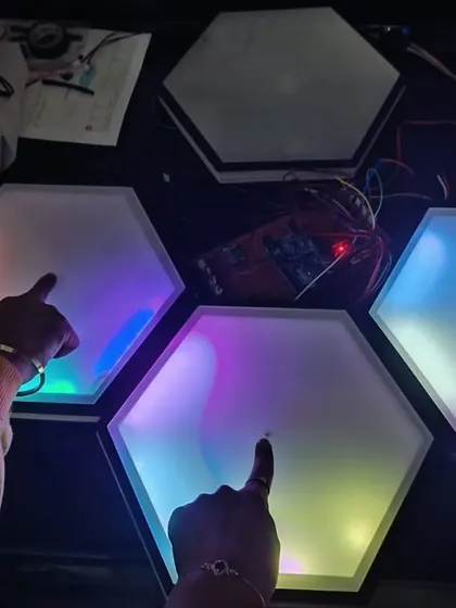 This interactive 'Canvas Beats' project features touch-sensitive hexagonal panels that light up and create music. It's a fantastic blend of electronics, coding, and art, built by our students for an FLL challenge.