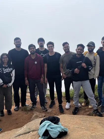 The group at the summit, tired but happy. There's a special bond formed when you conquer a peak together.