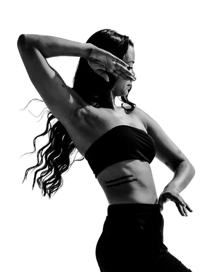 A high-contrast black and white shot from a movement series, focusing on lines and angles.